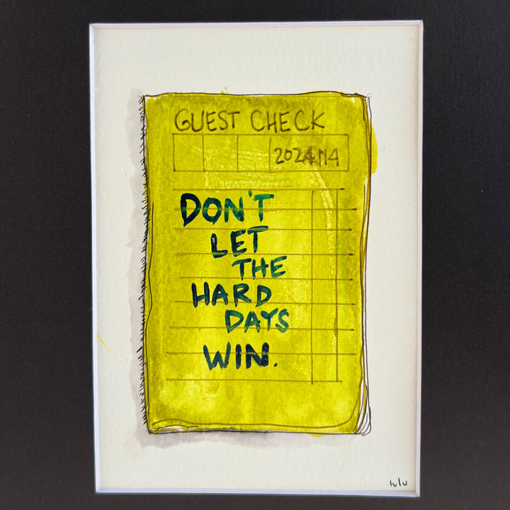 an original watercolor painting in shades of citron yellow, depicting a vintage crumpled diner guest check with the words, don't let the hard days win, matted in black