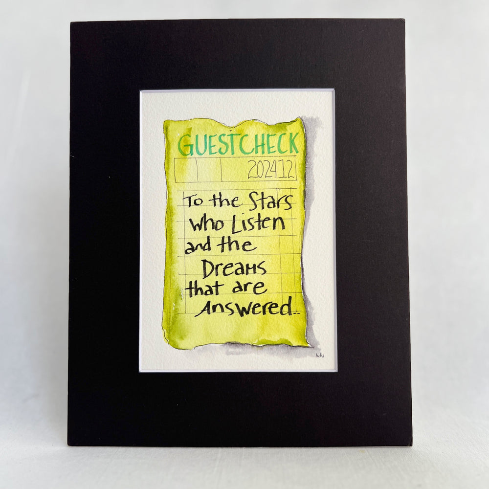 an original watercolor painting in shades of green-yellow, depicting a vintage crumpled diner guest check with the words, to the stars who listen and the dreams that are answered, matted in black