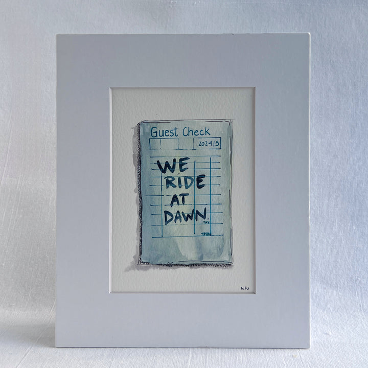 an original watercolor painting in shades of blue, depicting a vintage crumpled diner guest check with the words, we ride at dawn, matted in white