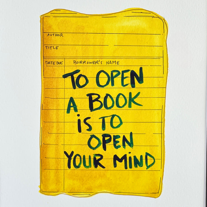 an original watercolor painting depicting a torn vintage library checkout card in shades of yellow with the words, to open a book is to open your mind, matted in black