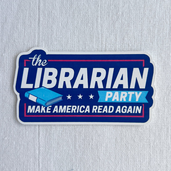 Oblong shaped sticker approximately 3 inches wide with a blue background and the words, "the LIBRARIAN PARTY. Make America read again," in white lettering.