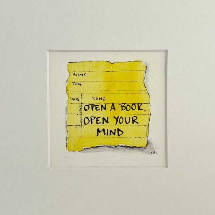 an original small watercolor painting depicting a torn vintage library checkout card in lemon yellow with the words, open a book open your mind matted in white